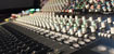 Close-up of our Solid State Logic XL-Desk analog mixing console.